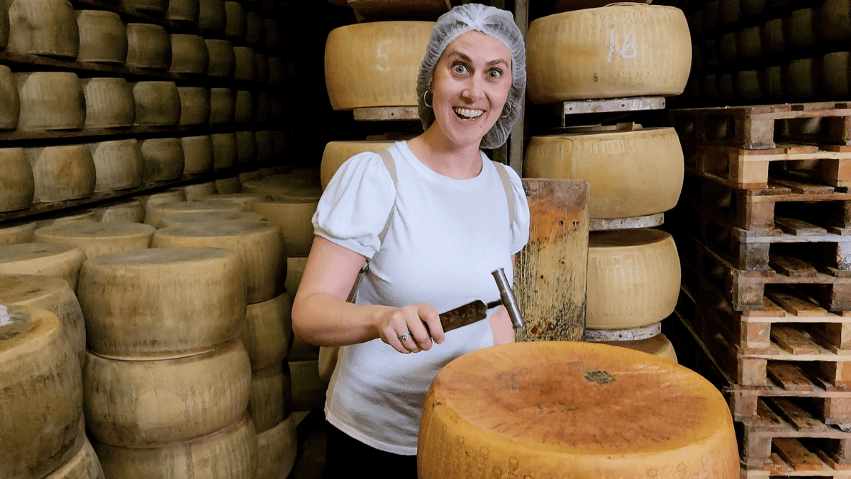 Sam in Parmesan Cheese factory in parma italy